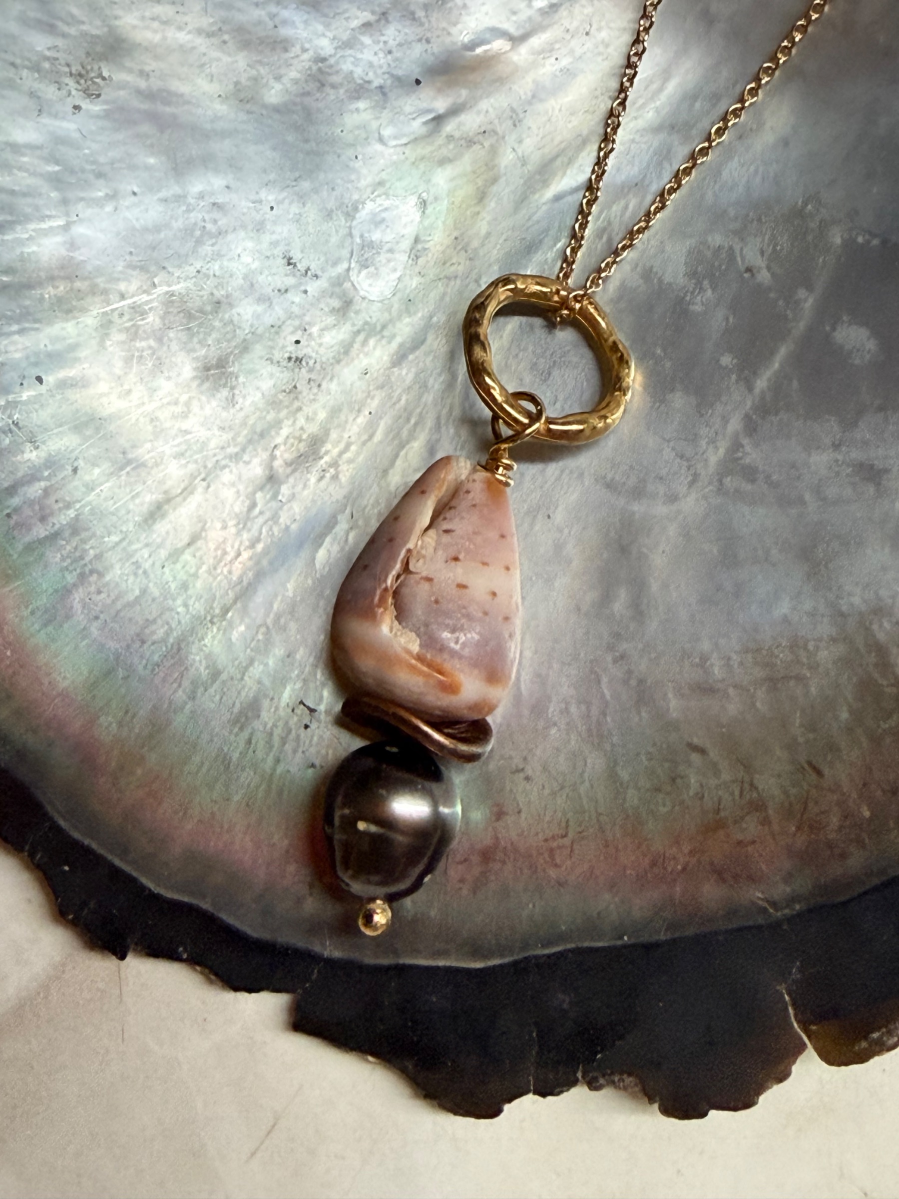 Tahitian pearl and cone shell necklace